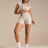 Motion Seamless Open Back Short Sleeve Crop Top | Stone