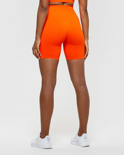 Orange cycling shorts sale